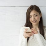Young women are using a smartphone